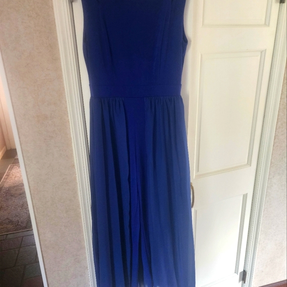 JUMPSUIT WYTH SHEER SKIRT. NO tag.Size L pit to pit 20".Newer wear. - Picture 2 of 7